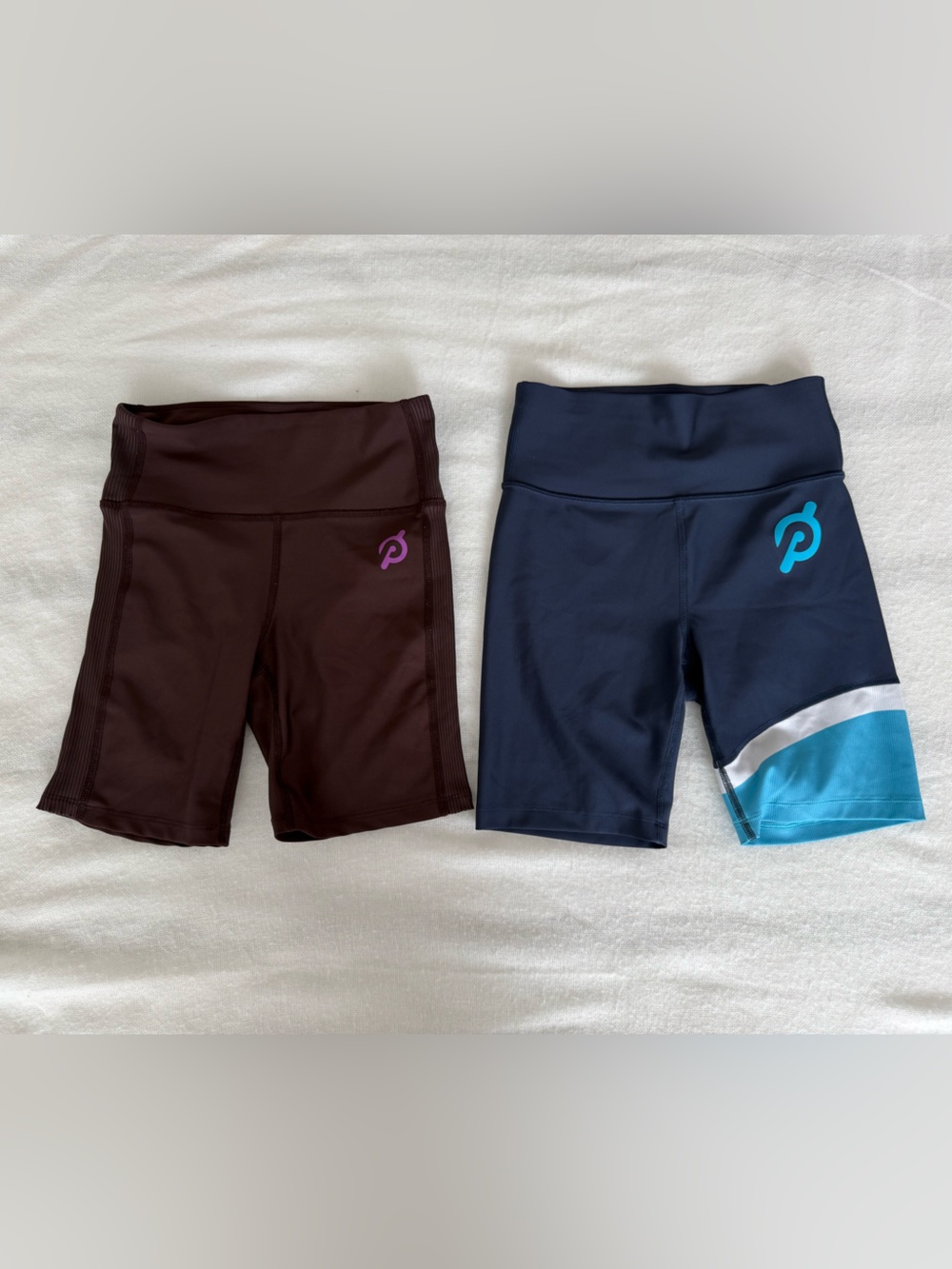 Peloton bike shorts -2 pack — Navy with Teal Accent & Brown with Purple Logo